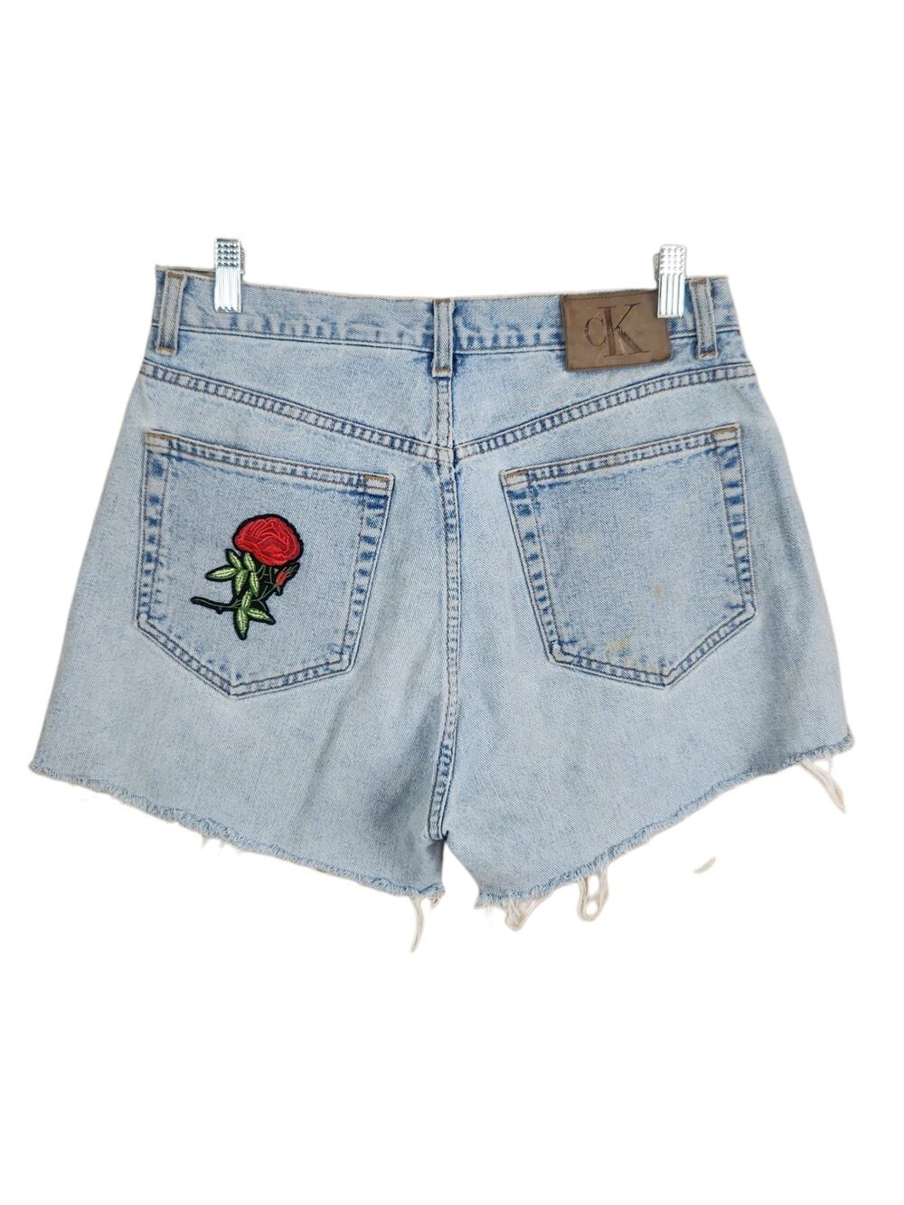90s Vtg Calvin Klein Rose Patch Light Wash Denim Cut-Off Shorts 31" Women Large